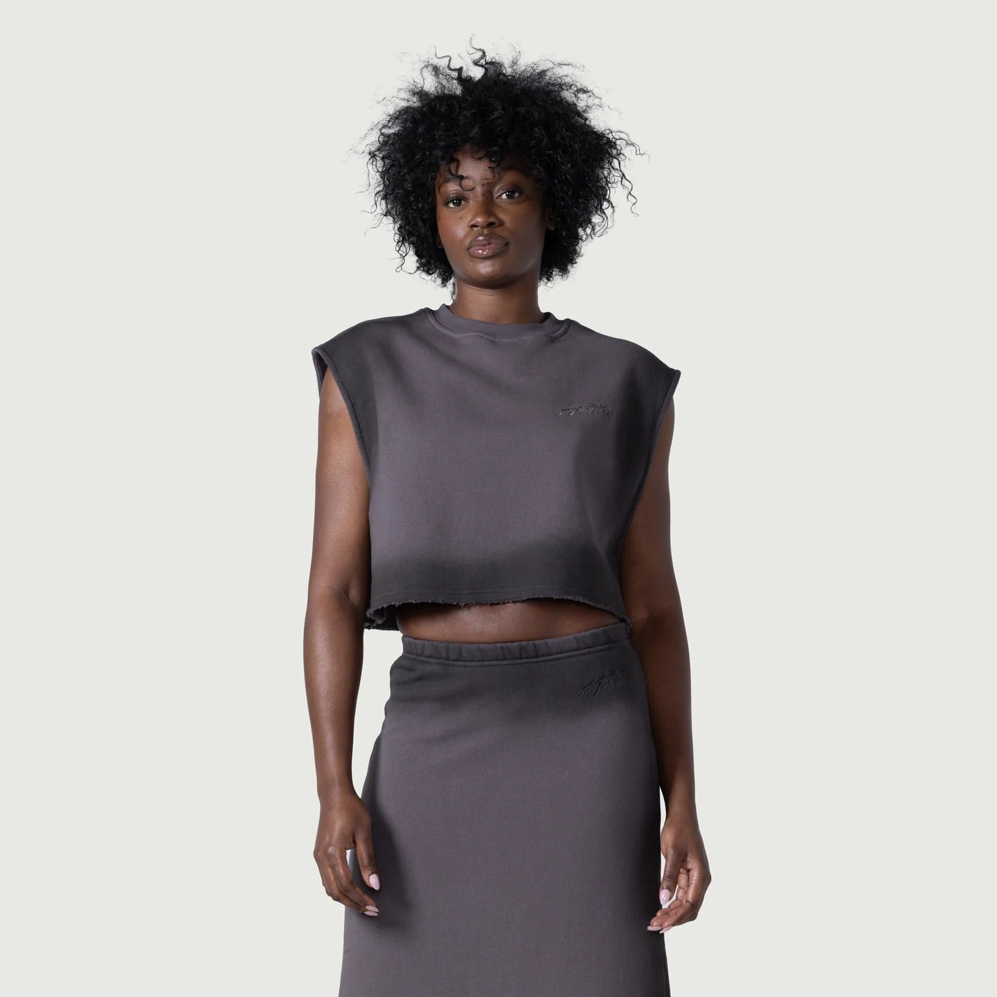 Honor the Gift Cropped Spray Muscle Top- Black